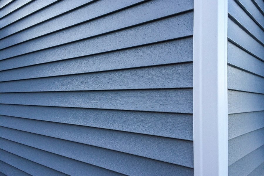 Selection of premium home siding samples and exterior finishes for modern residential design.